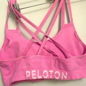 Peloton pink candy strappy sports bra. OG. Worn a few times .Excellent condition